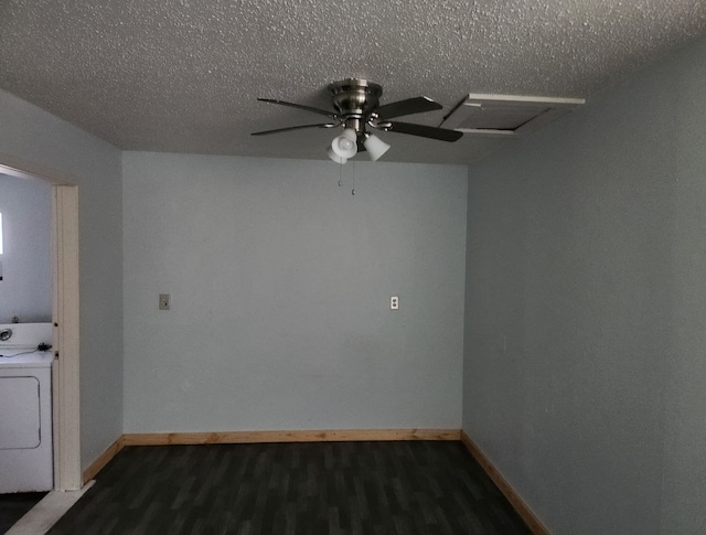 unfurnished room featuring a textured ceiling, ceiling fan, washer / clothes dryer, and dark hardwood / wood-style floors