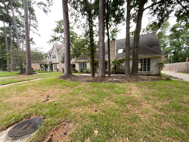 view of front of property with a front lawn