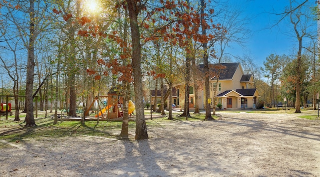 view of front facade with a playground