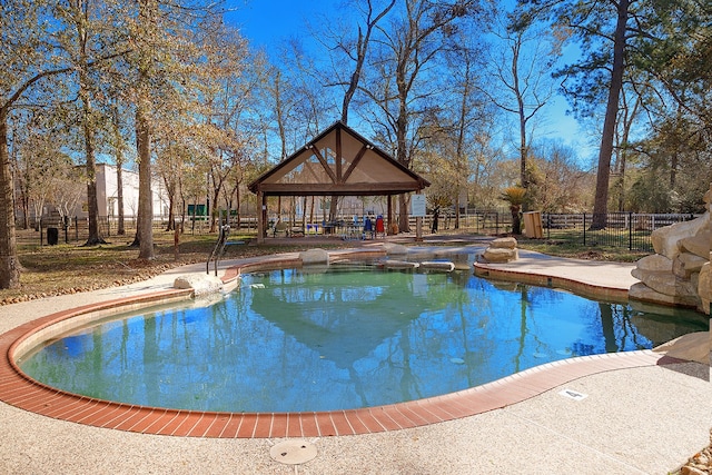 view of swimming pool with a gazebo