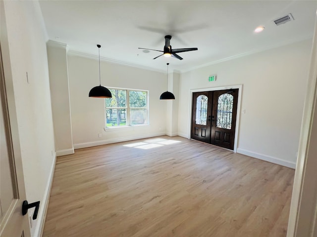 entryway with french doors, light hardwood / wood-style flooring, ornamental molding, and ceiling fan