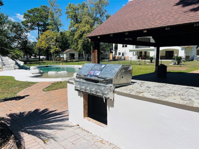 view of patio with a gazebo and a fenced in pool