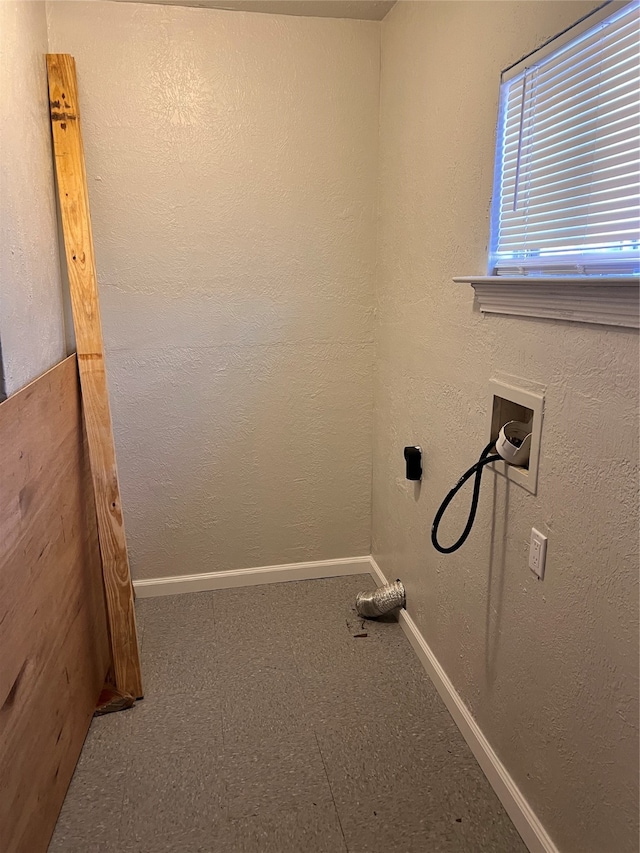 laundry area featuring tile flooring