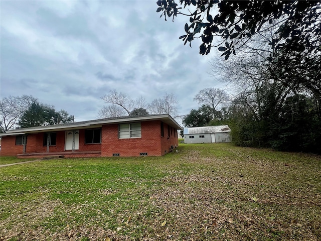 exterior space with a lawn