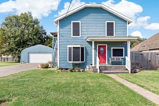 view of front of house featuring a front yard and a garage