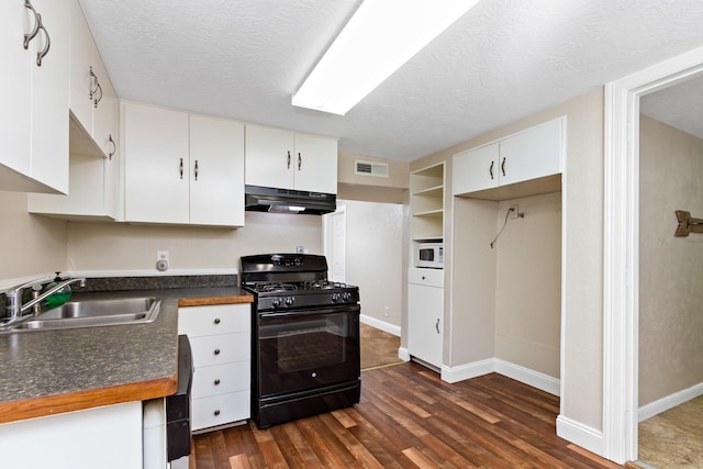 kitchen with dark wood-type flooring, a textured ceiling, sink, black range with gas cooktop, and white cabinets