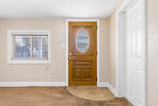 view of carpeted entryway