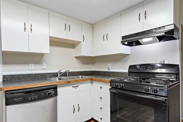 kitchen with black gas range oven, sink, white cabinets, and dishwasher