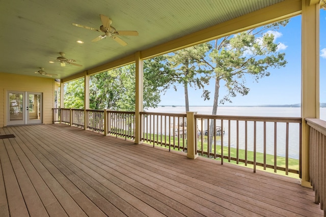 wooden terrace featuring ceiling fan