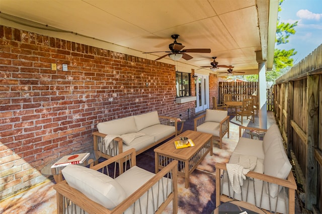 view of patio / terrace featuring outdoor lounge area and ceiling fan