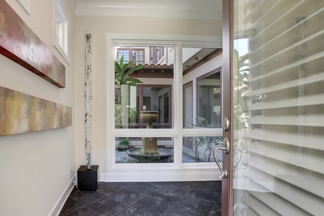 exterior space featuring ornamental molding and dark tile floors