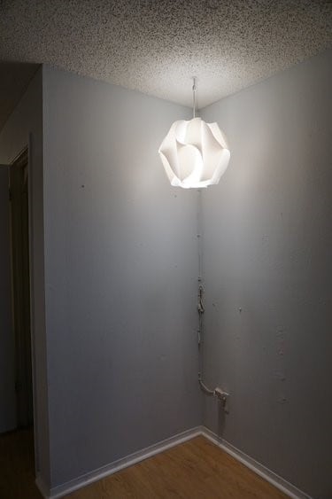 empty room featuring hardwood / wood-style floors and a textured ceiling