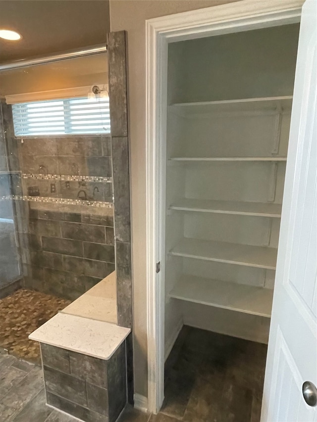 bathroom with tile flooring