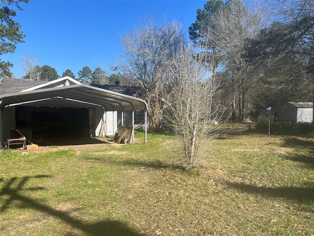 view of yard with a carport