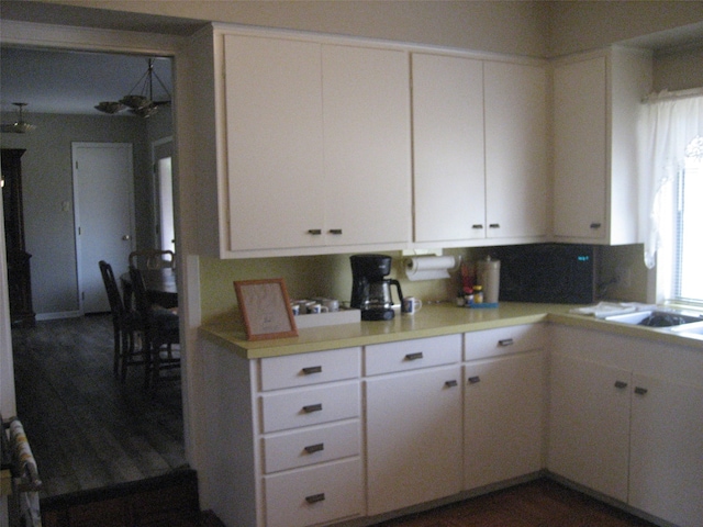 kitchen featuring white cabinetry