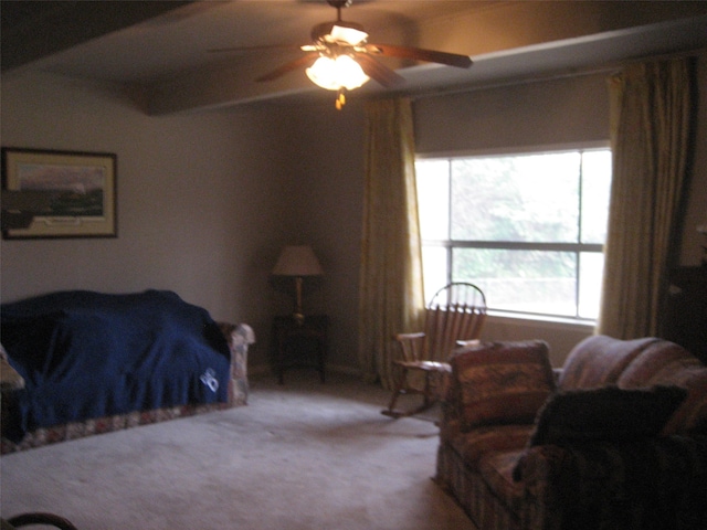 bedroom featuring light carpet and ceiling fan