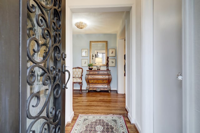 foyer entrance featuring a textured ceiling and hardwood / wood-style flooring