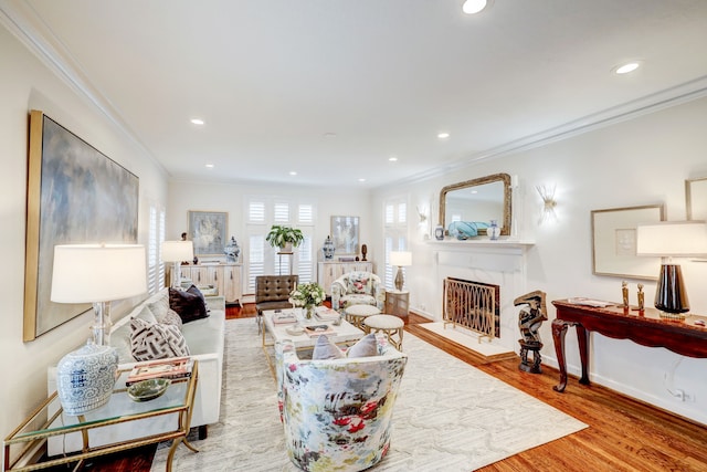 living room featuring crown molding and wood-type flooring