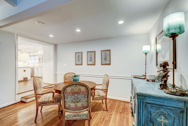 dining room with light hardwood / wood-style floors