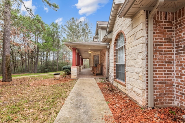 property entrance featuring a patio