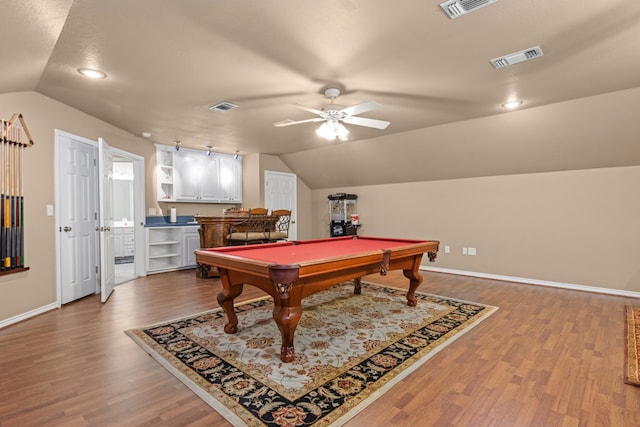 game room with ceiling fan, bar, billiards, wood-type flooring, and lofted ceiling