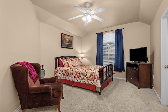 carpeted bedroom with lofted ceiling and ceiling fan