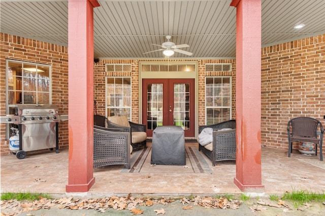 view of patio featuring a grill, french doors, and ceiling fan