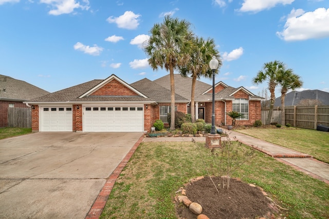 view of front facade featuring a front lawn and a garage