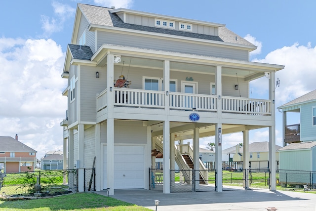 rear view of property with covered porch