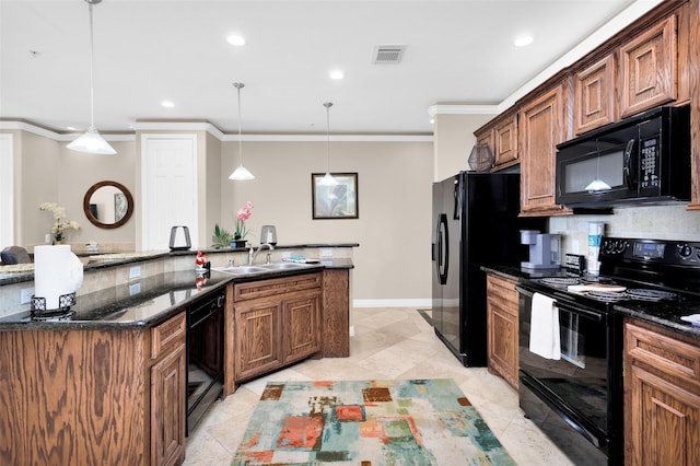 kitchen featuring sink, crown molding, dark stone countertops, hanging light fixtures, and black appliances