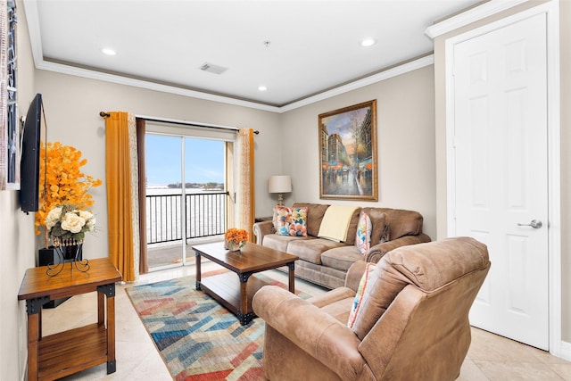 living room with ornamental molding and light tile patterned flooring