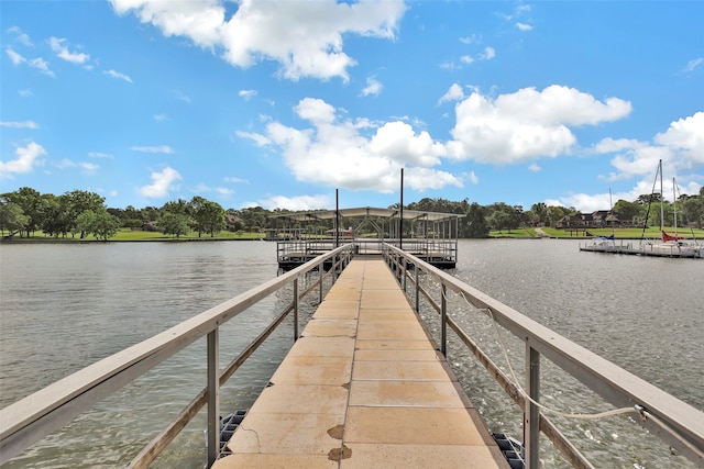 view of dock with a water view