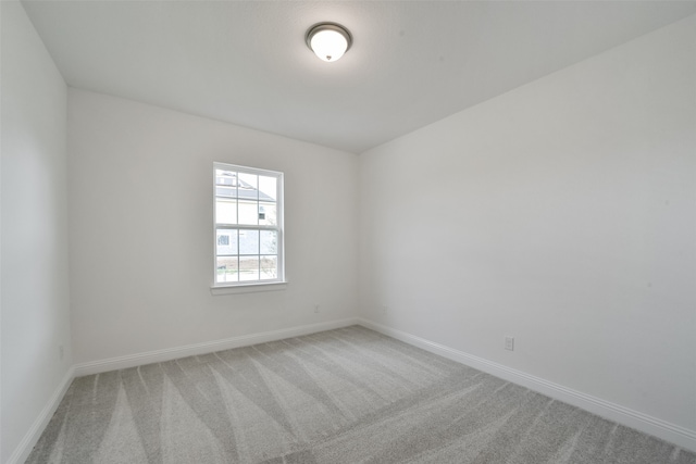 unfurnished room with carpet