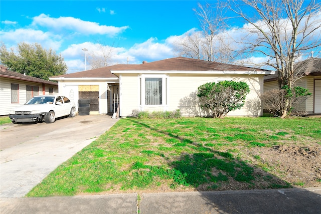 ranch-style home with a front yard