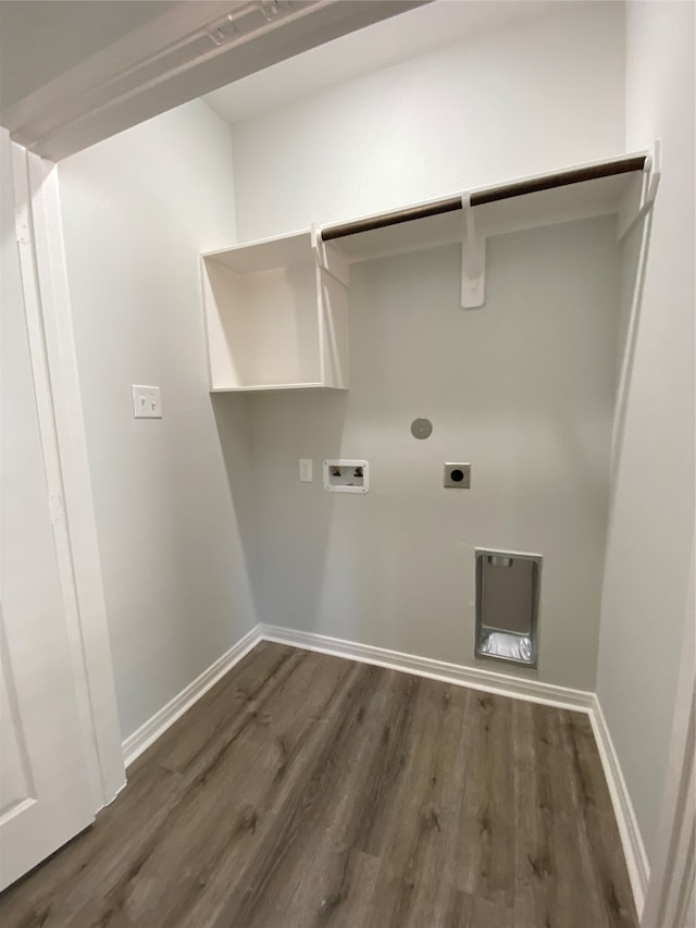 clothes washing area featuring electric dryer hookup, dark wood-style flooring, hookup for a washing machine, and baseboards