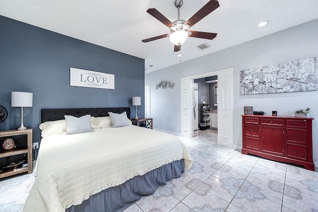 bedroom with ceiling fan and light tile flooring