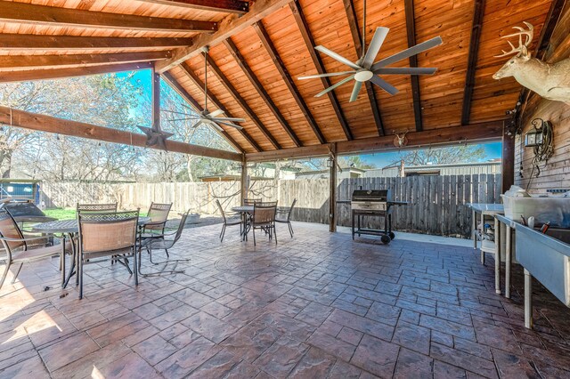 view of patio / terrace featuring ceiling fan and grilling area