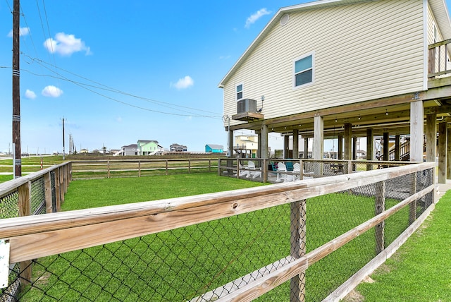 view of yard with central AC