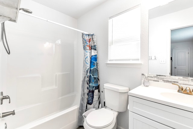 full bathroom with toilet, shower / tub combo with curtain, and vanity