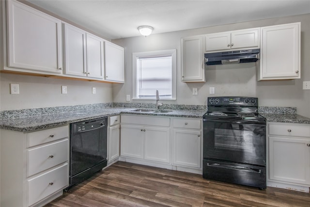 kitchen featuring dark hardwood / wood-style floors, white cabinetry, sink, and black appliances