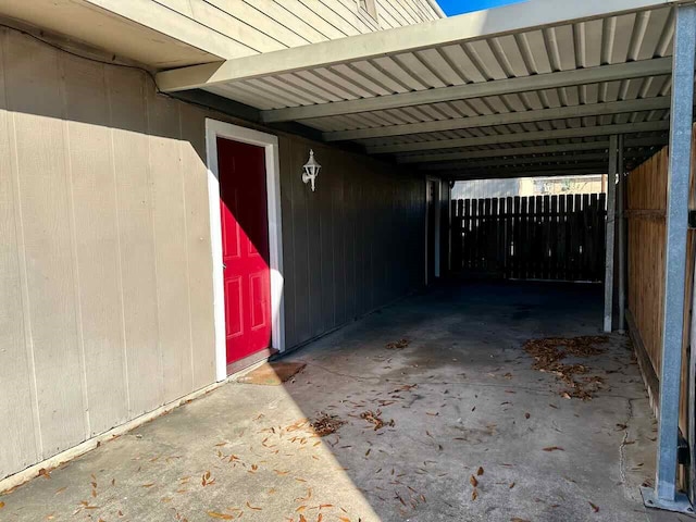 exterior space with a carport