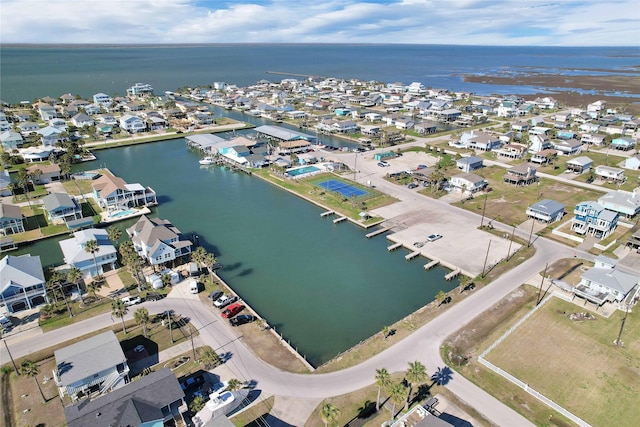 bird's eye view with a residential view and a water view