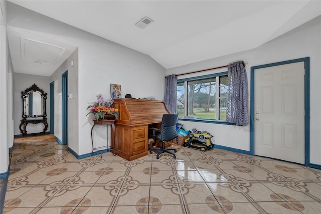 office featuring vaulted ceiling and light tile patterned floors