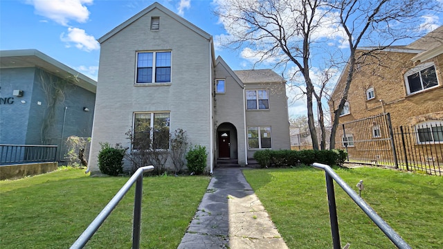 view of front facade with a front yard