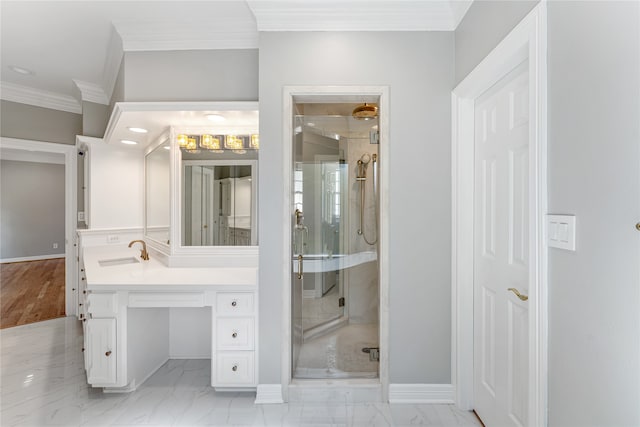 bathroom featuring ornamental molding, a shower with door, and vanity