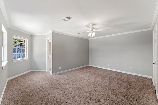 carpeted spare room with ornamental molding and ceiling fan