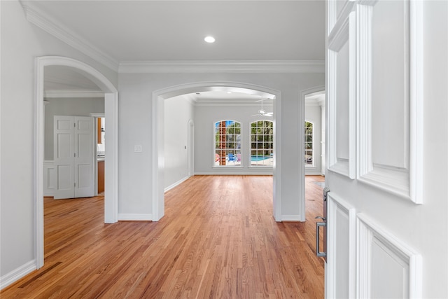 entryway featuring light hardwood / wood-style flooring and ornamental molding