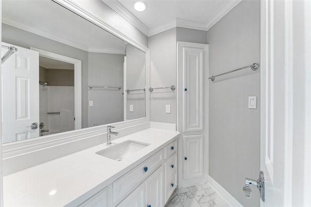 bathroom featuring ornamental molding and vanity