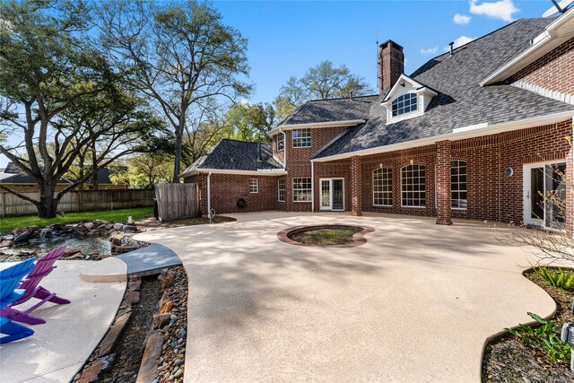 rear view of property with a patio area