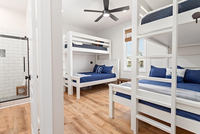 bedroom with hardwood / wood-style floors and ceiling fan